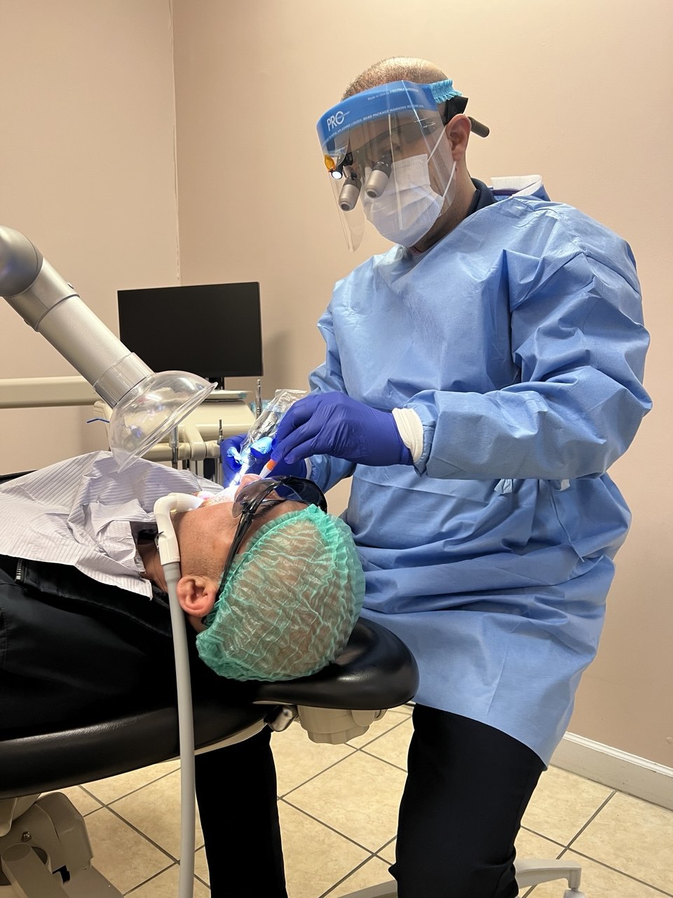 Extra-oral suction system capturing aerosols during treatment at Richmond Dental Spa